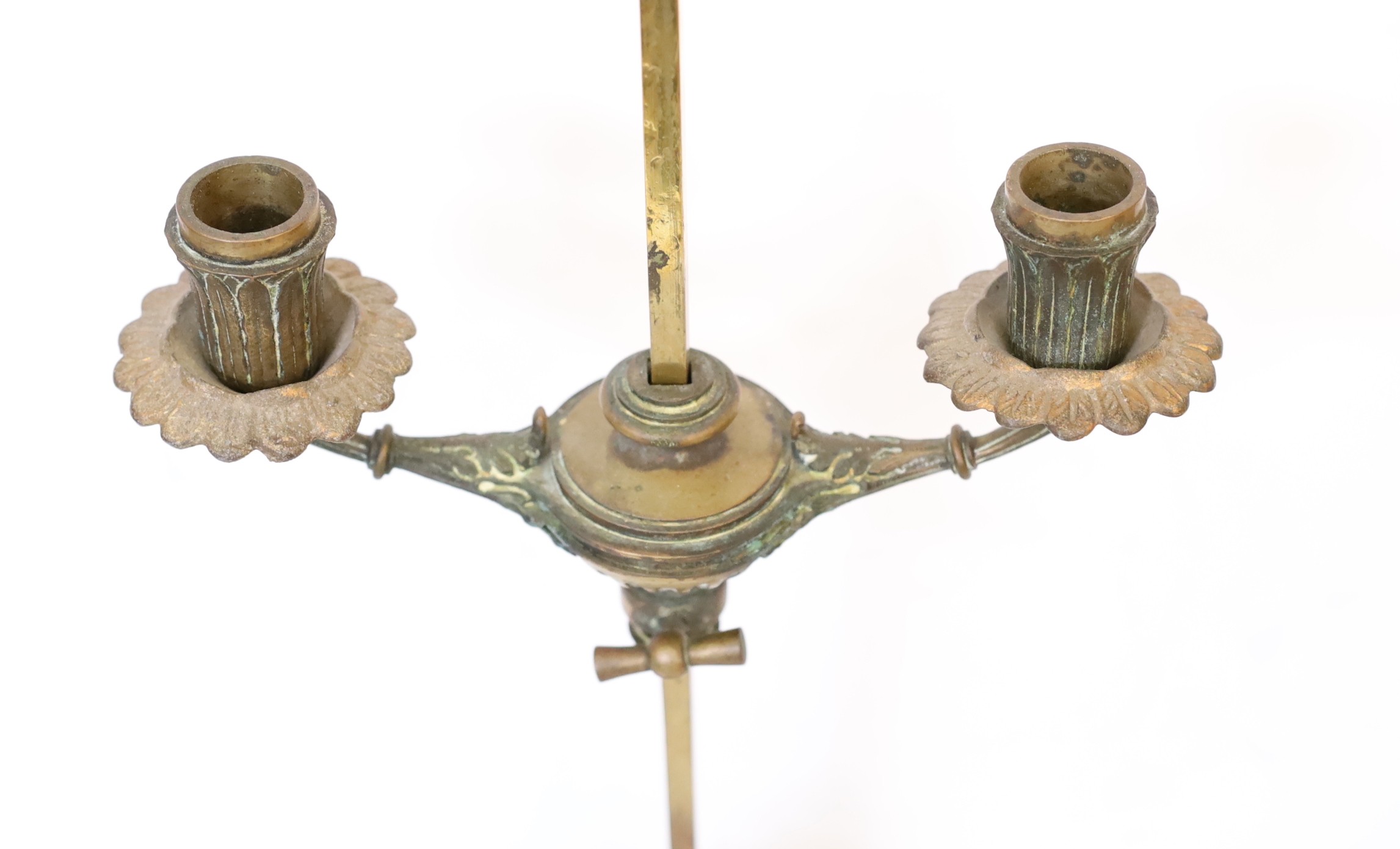 An early 20th century French ormolu adjustable twin branch candelabrum, with loaded base, height 57cm